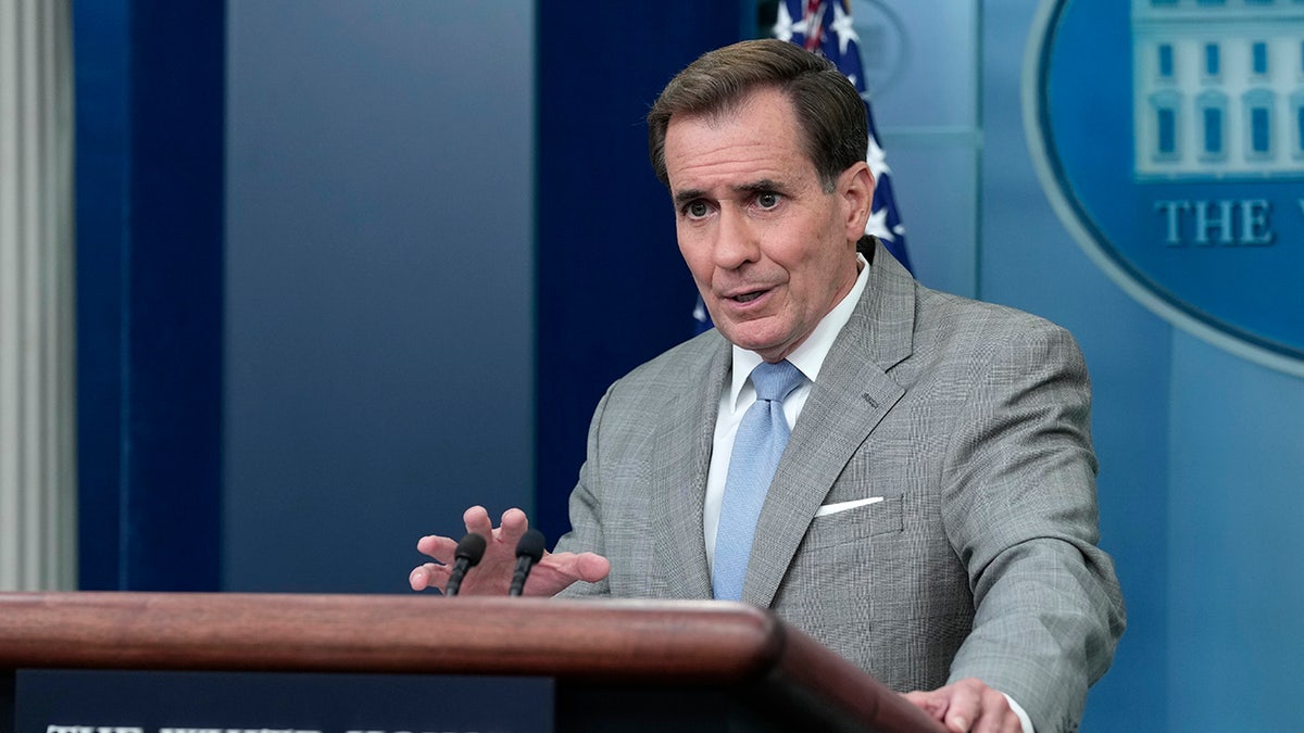 John Kirby stands at White House podium