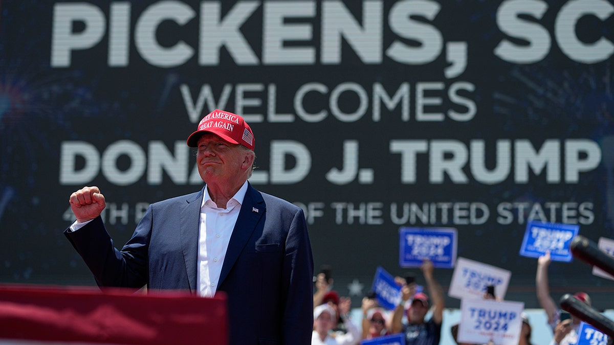 Trump on stage at a rally