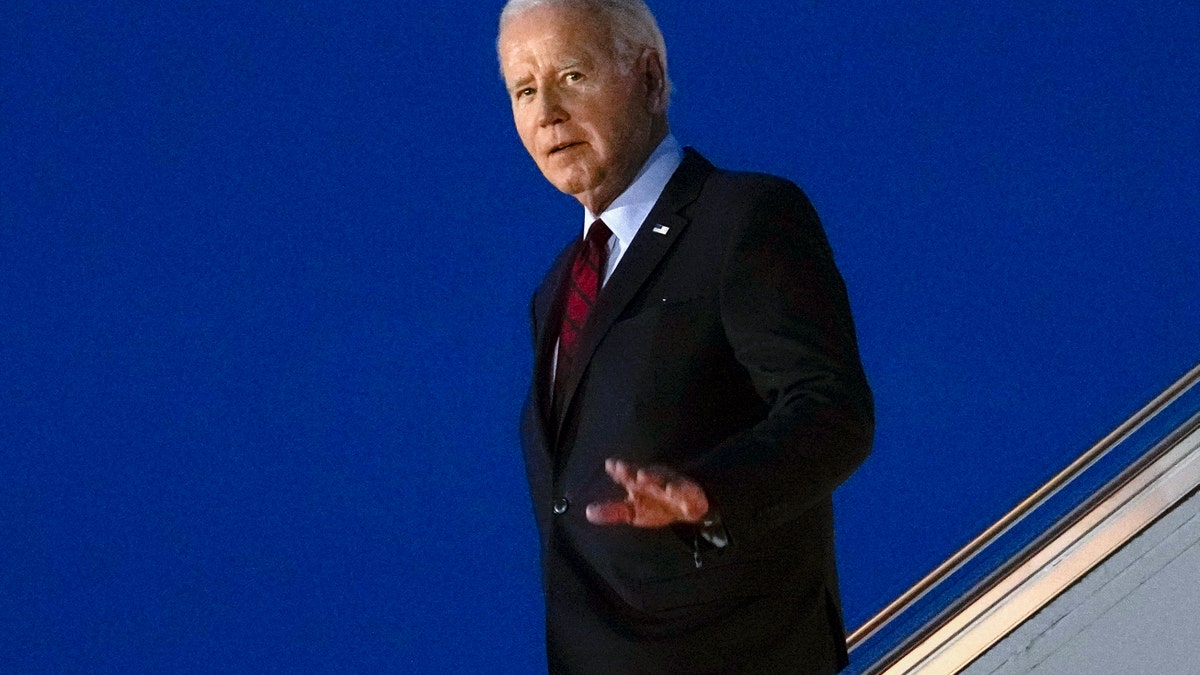 Biden arrives in UK