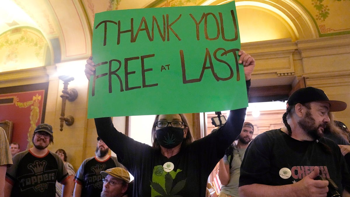 Activist holding sign