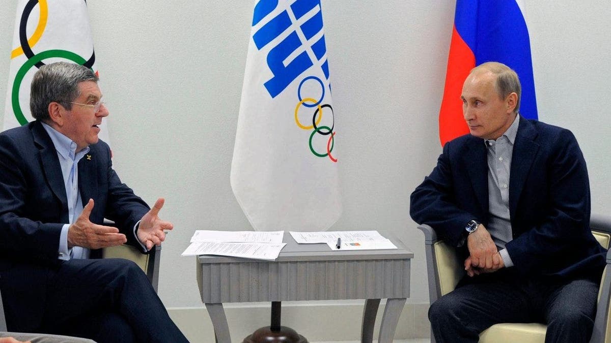 Presiden Vladimir Putin, Presiden IOC Thomas Bach 