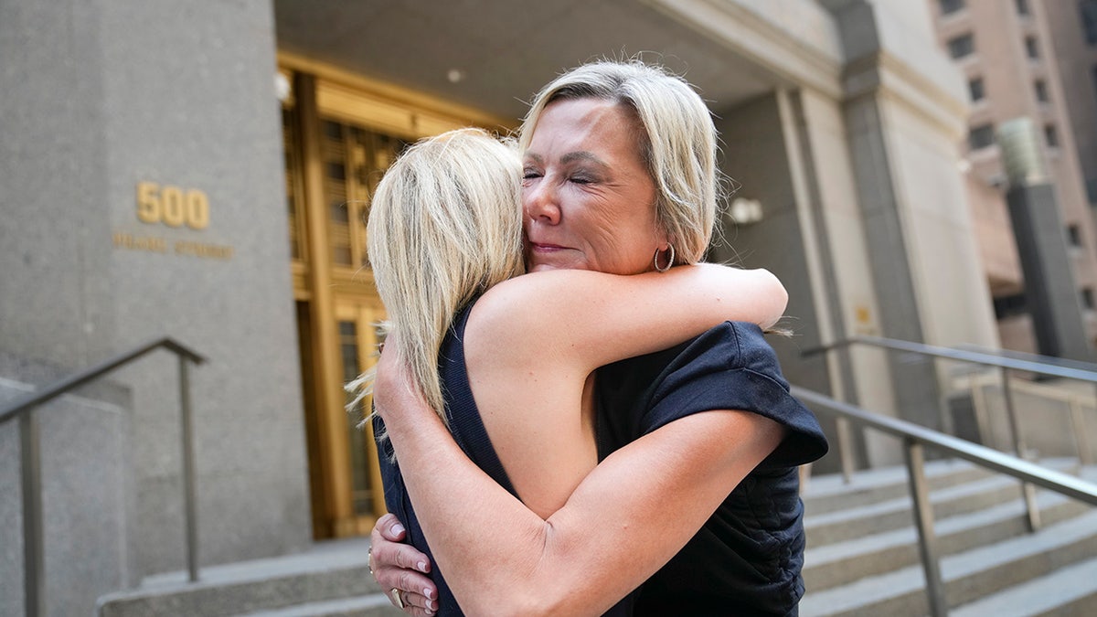Robert Hadden sexual assault victims embrace outside his federal sentencing