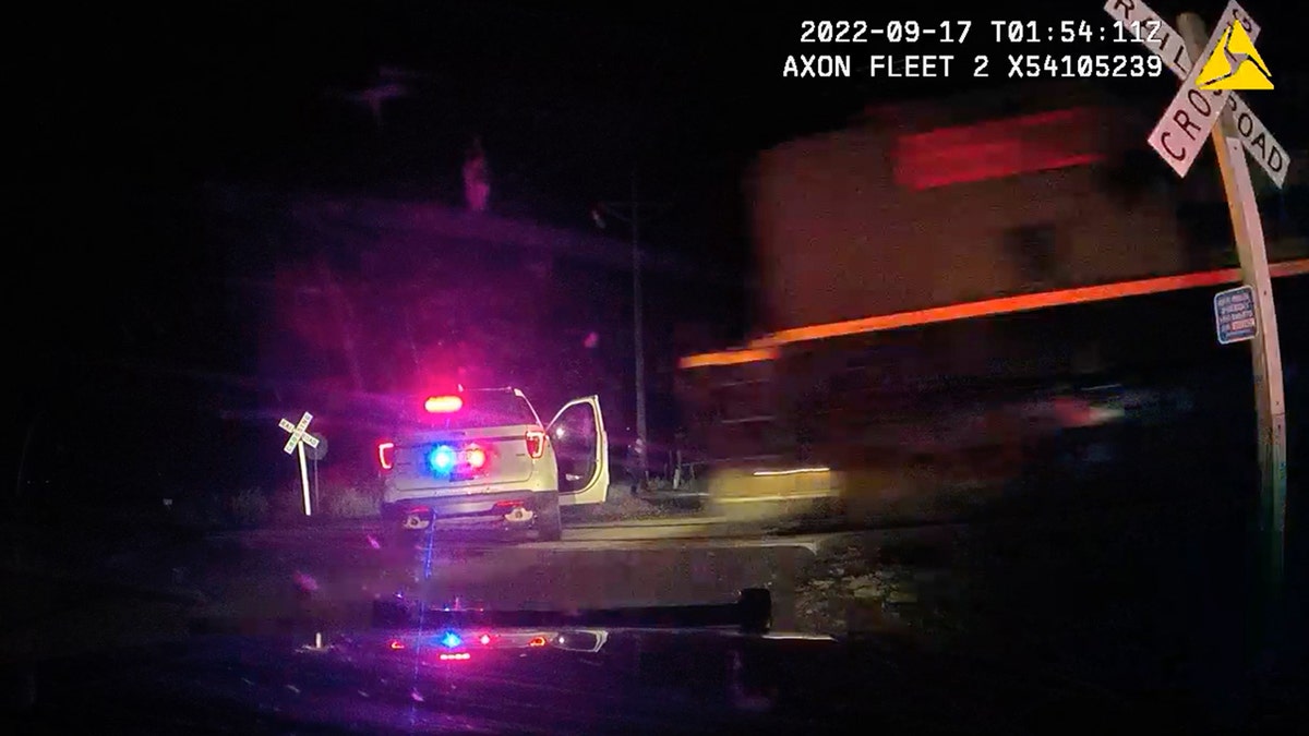 Car being hit by freight train