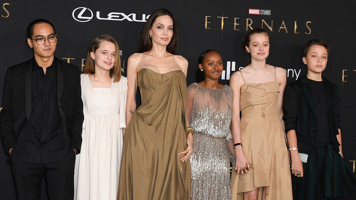 Angelina Jolie and her kids at a red carpet