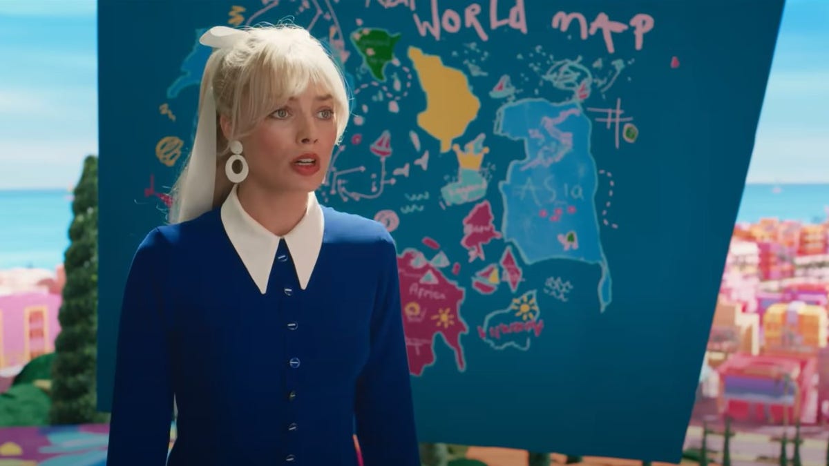 Margot Robbie in front of the cartoon map showing the nine dash line