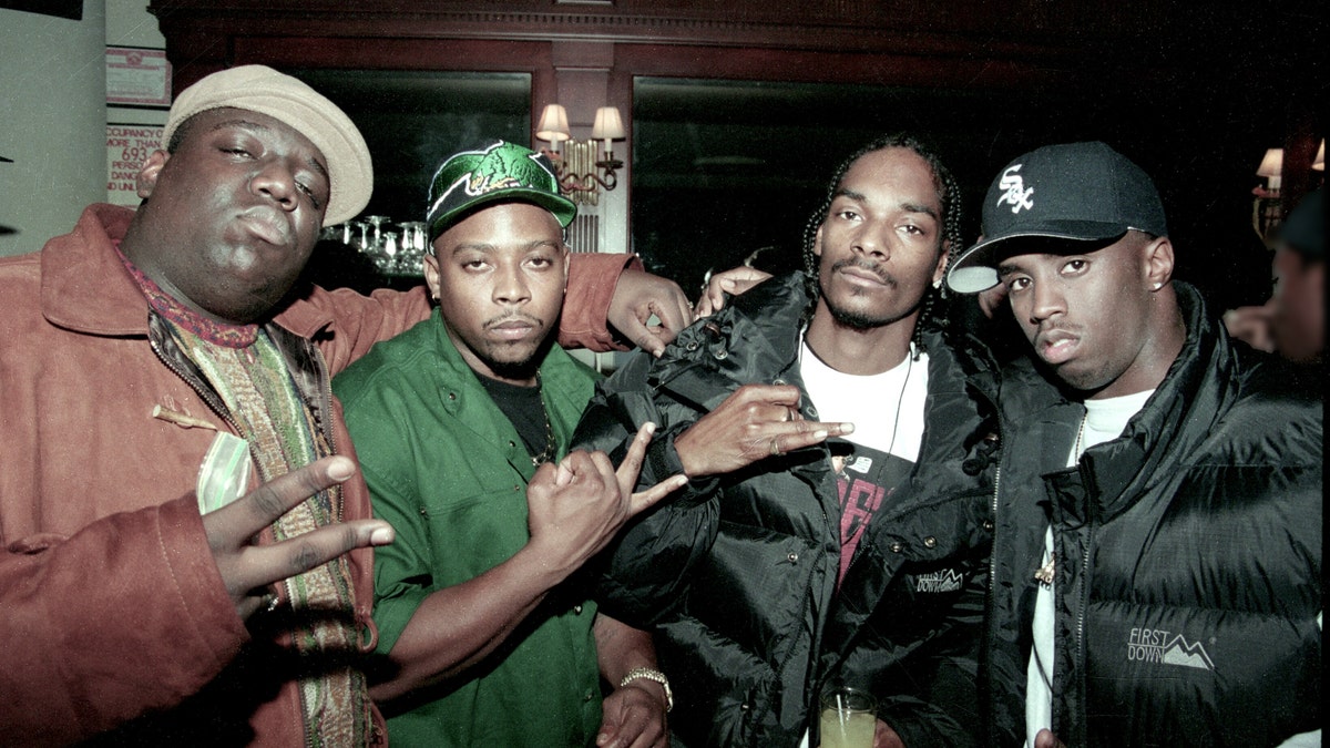 American rappers Notorious BIG, Nate Dogg, Snoop Dogg, and Sean Combs in 1995