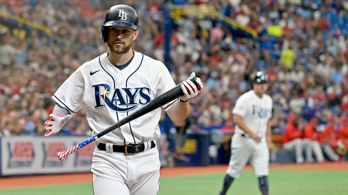 Brandon Lowe walks back to dugout