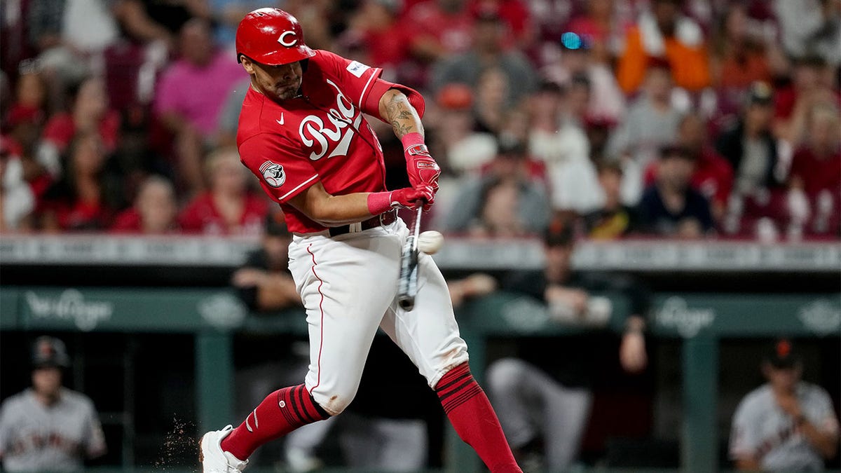 Christian Encarnacion-Strand of the Cincinnati Reds slides in safely  News Photo - Getty Images