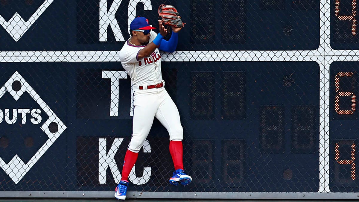 Johan Rojas makes a catch during a Phillies game