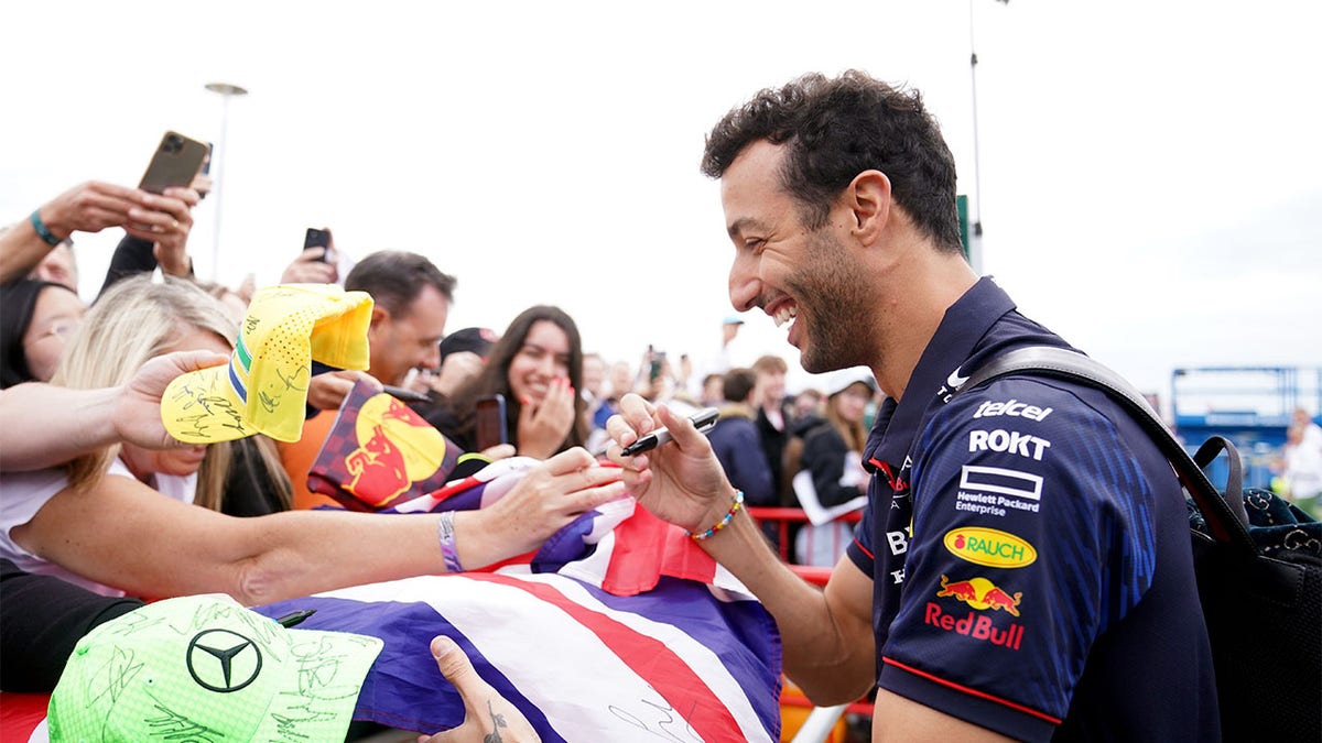 Daniel Ricciardo signing autographs