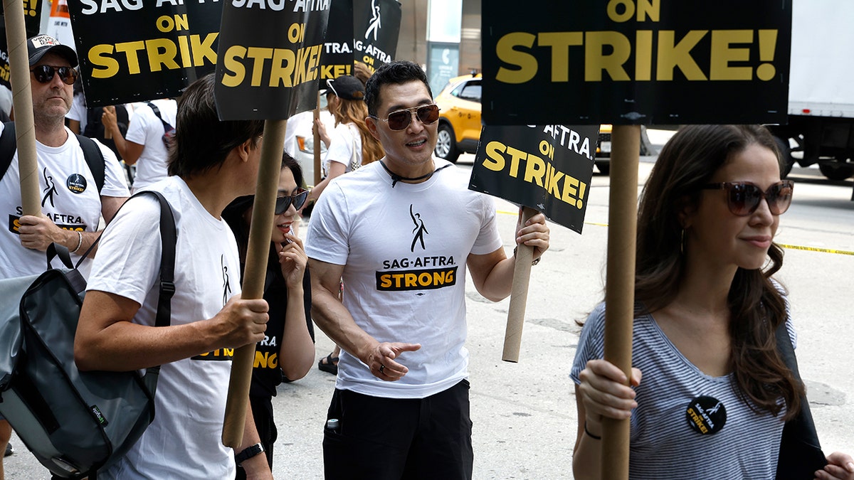 Daniel Day Kim protesting outside Amazon Studios