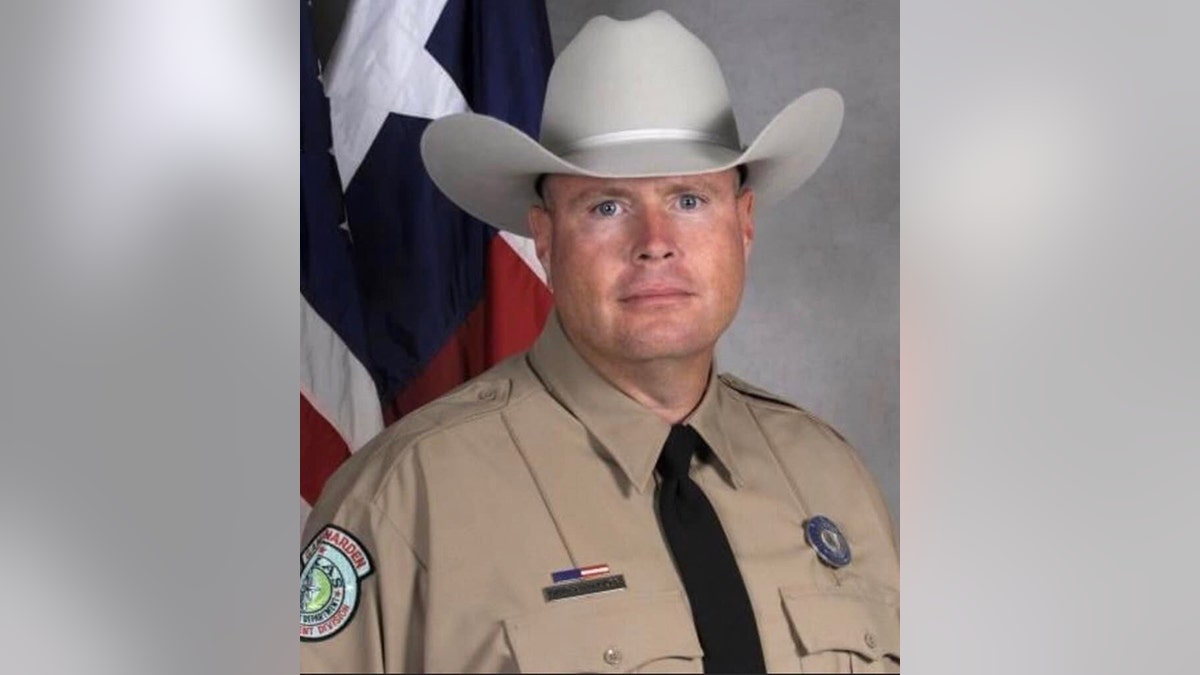 Deputy David Bosecker poses for offixial portrait