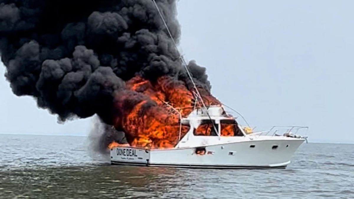 flames engulfing boat