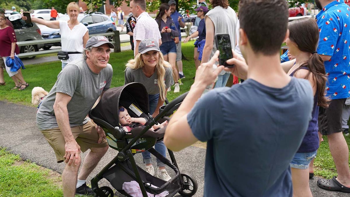 North Dakota Governor Doug Burgum greets supporters