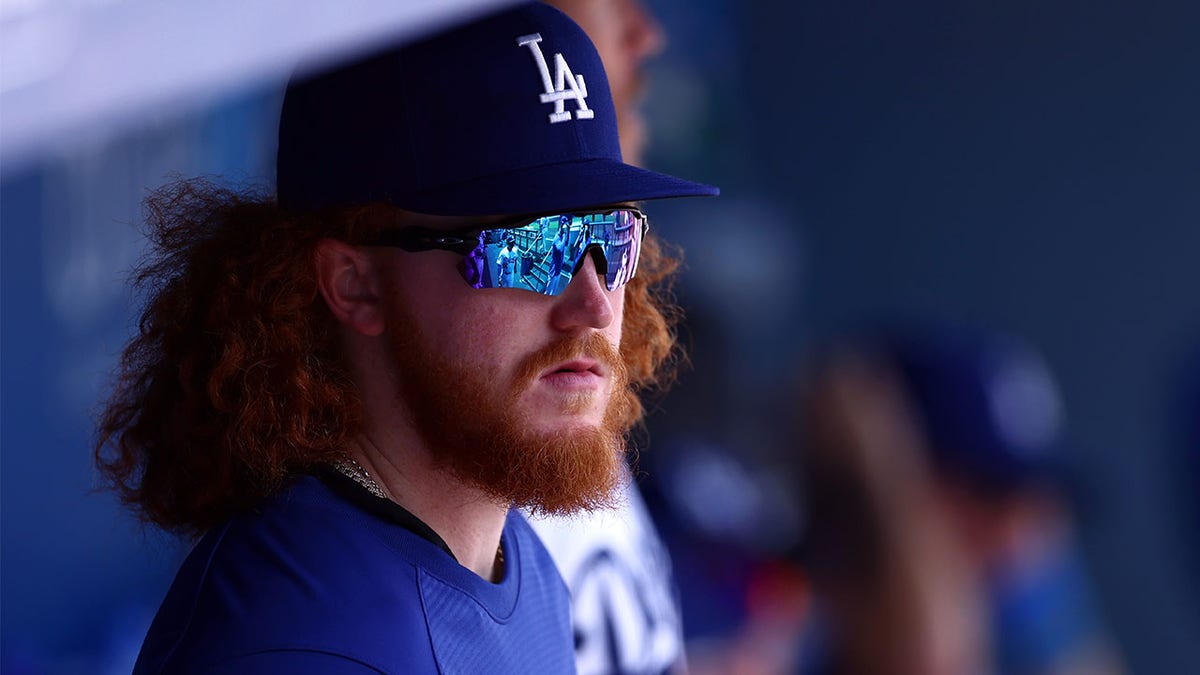 Dustin May looks on