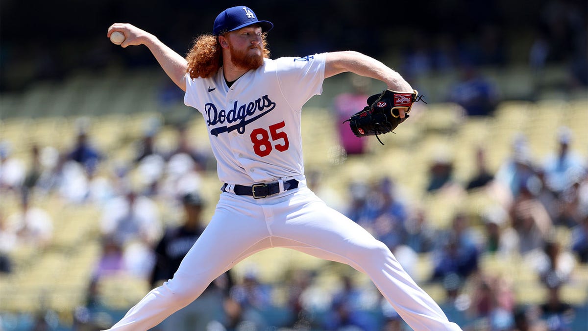 Dustin May throws pitch