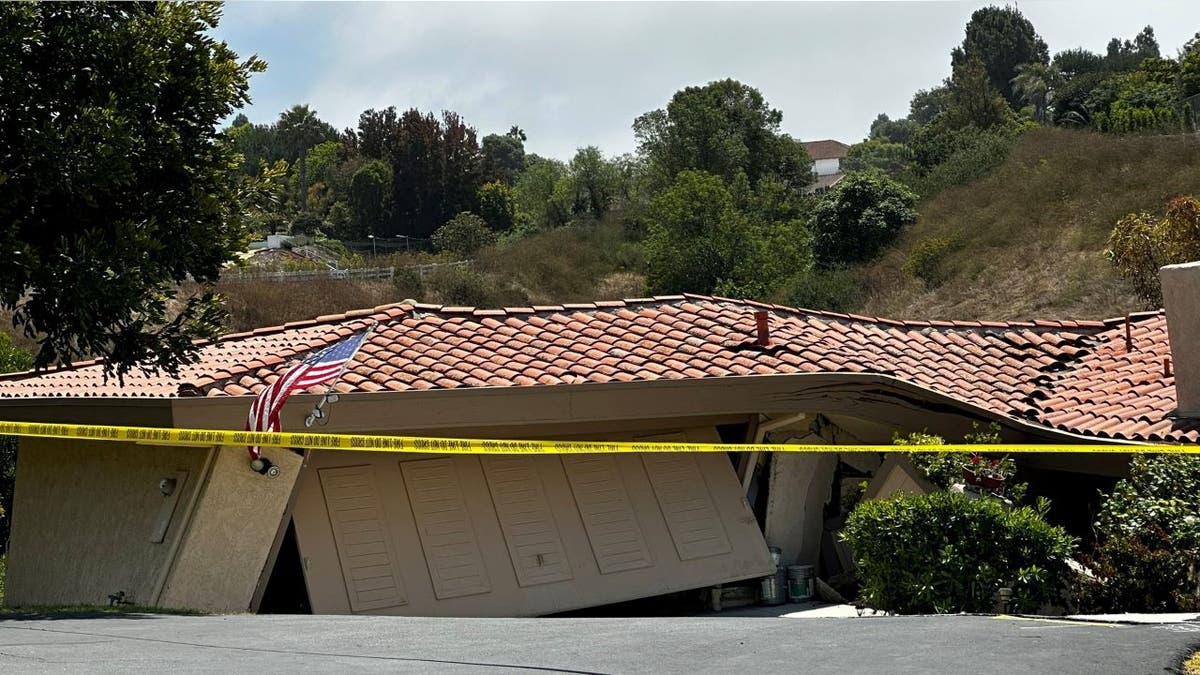 Crime scene tape outside of Rolling Hills Estates home