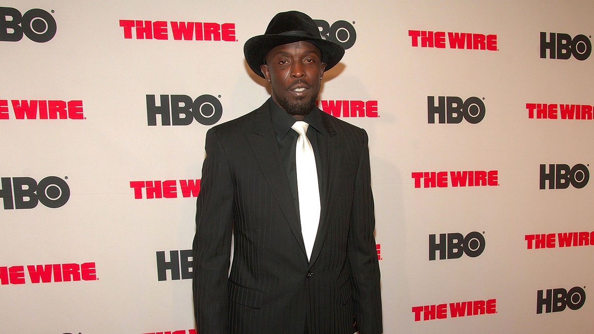Michael K Williams wearing a hat