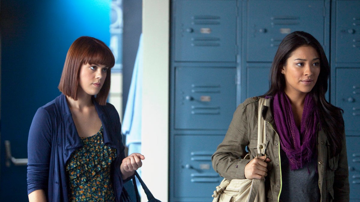 Lindsey Shaw and Shay Mitchell in a scene from Pretty Little Liars