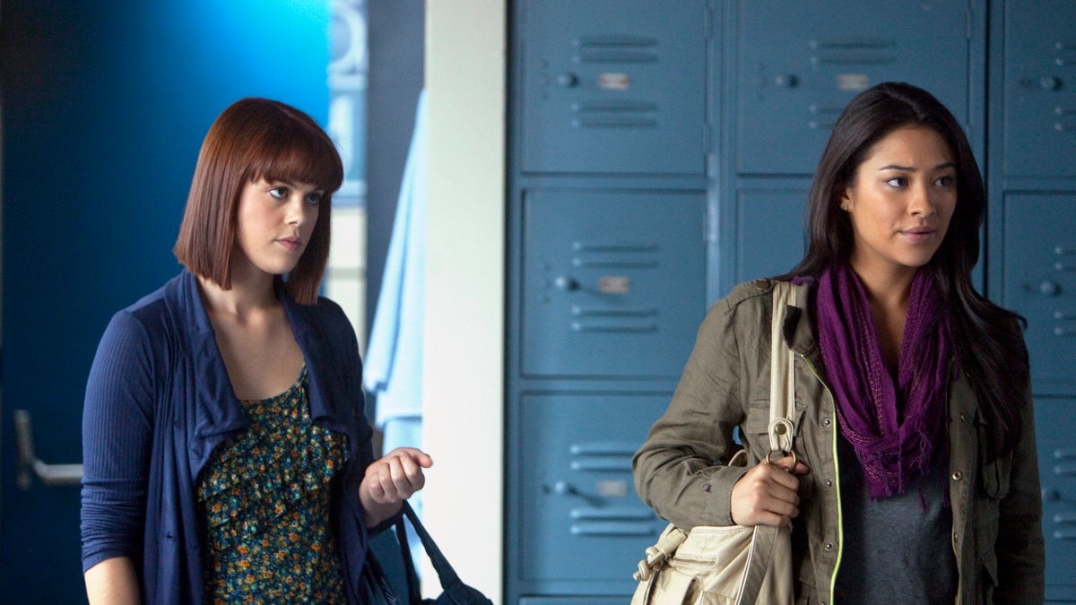 Lindsey Shaw and Shay Mitchell in a scene from Pretty Little Liars