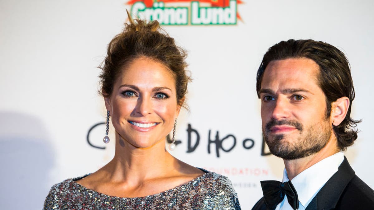 prince carl and princess madeleine of sweden on red carpet