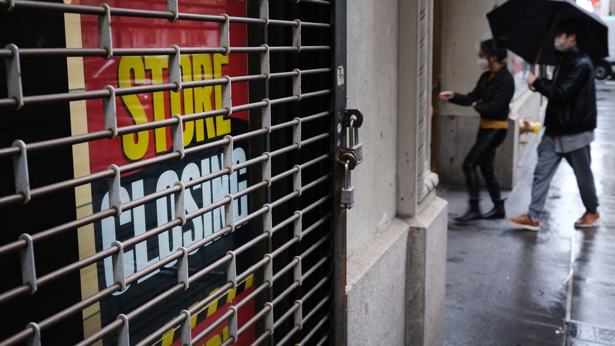A store stands closed near Wall Street as the coronavirus kept financial markets and businesses mostly closed on May 8, 2020 in New York City.