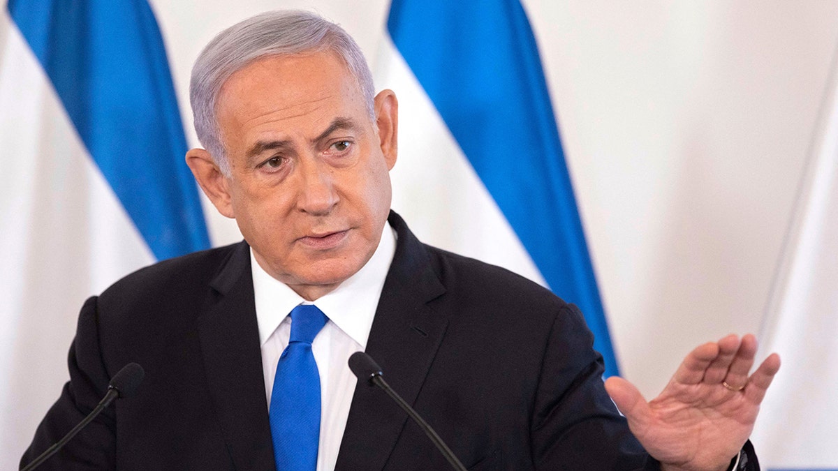 Netanyahu speaking astatine podium