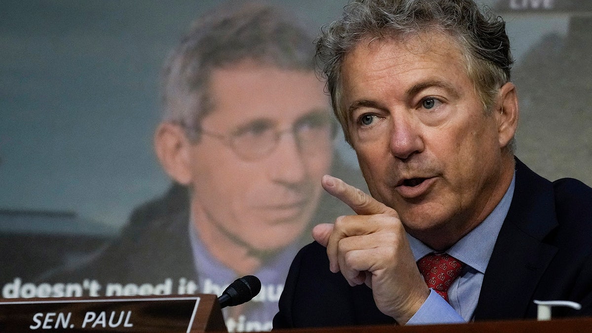 Sen. Rand Paul points toward Fauci during a line of questioning