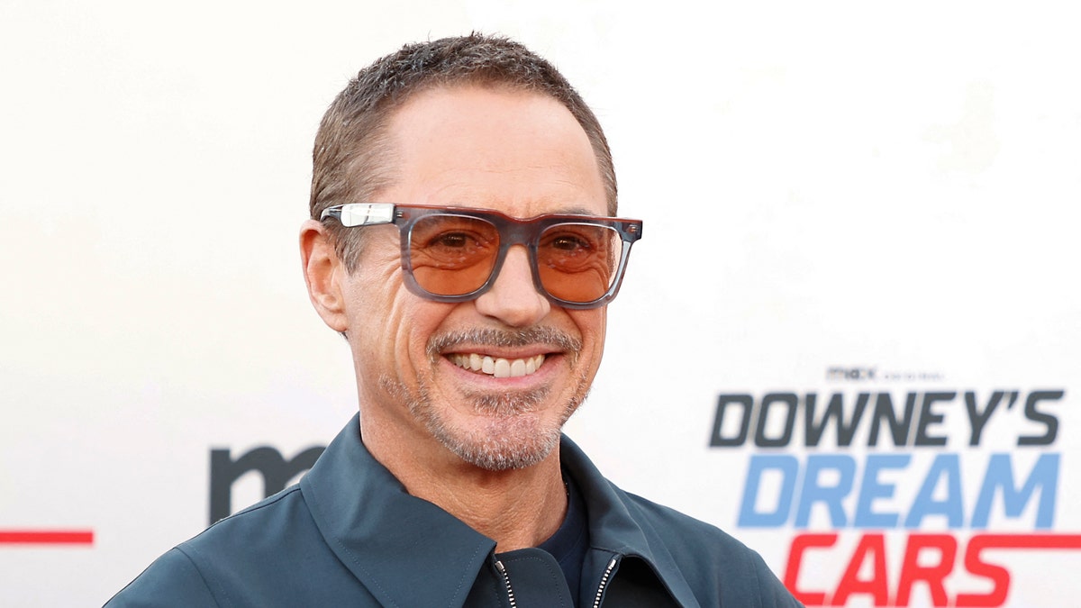 Robert Downey Jr. wearing sunglasses on the red carpet