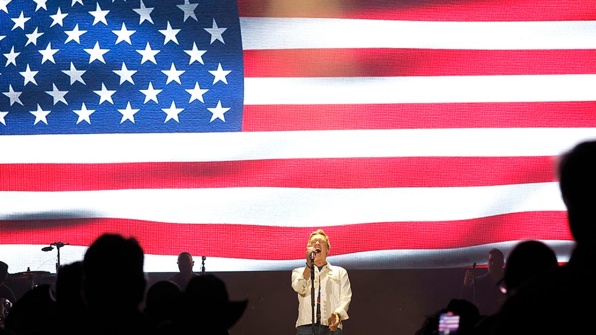 craig morgan sings in front of american flag