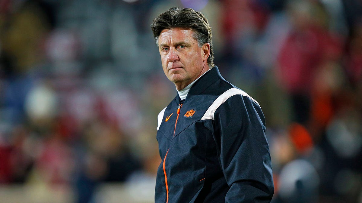 Mike Gundy coaches against Oklahoma