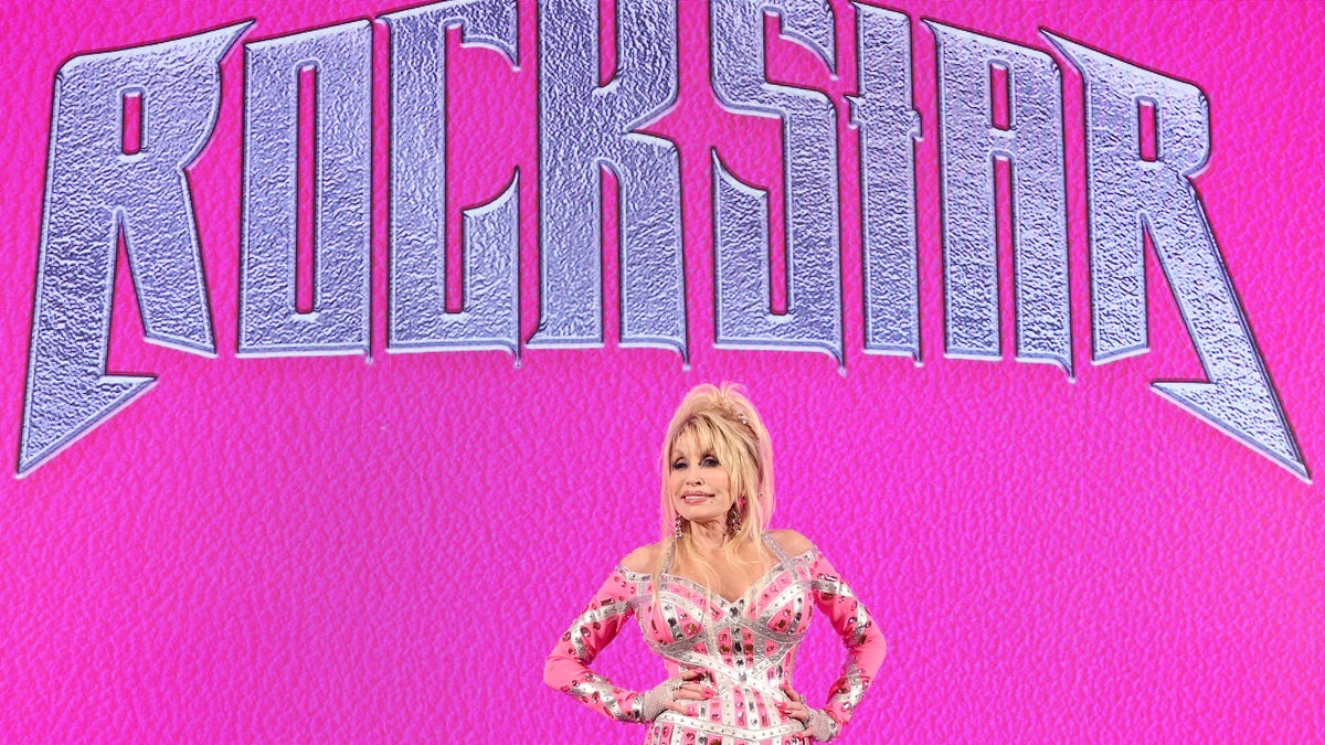 dolly parton in front of rockstar sign