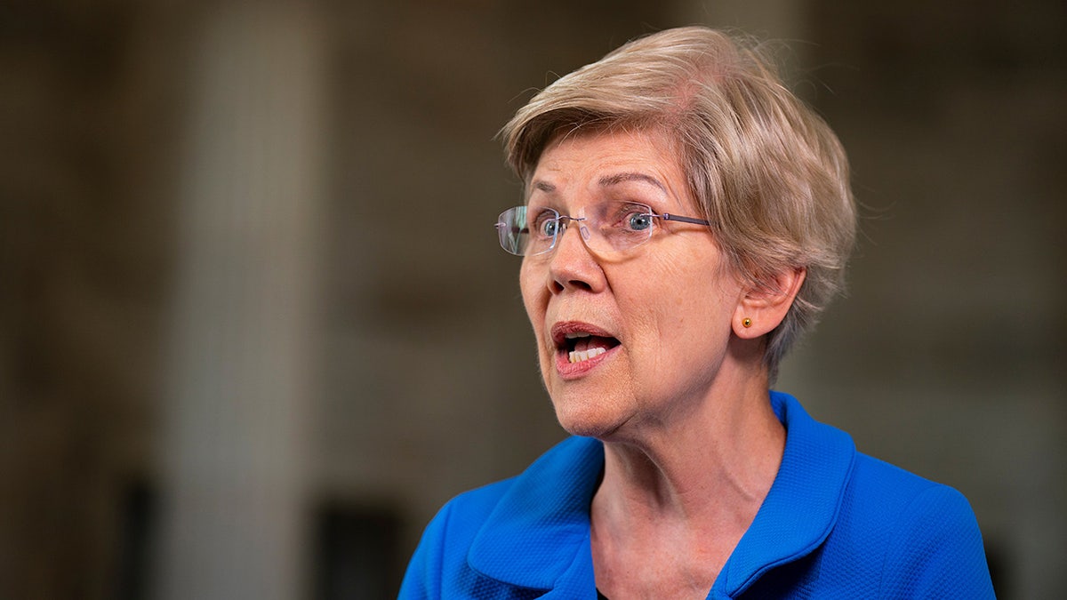 Elizabeth Warren gives an interview from inside the Capitol building