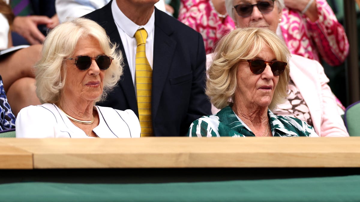 Queen Camilla and her sister Annabel Elliot watch Wimbledon from their box