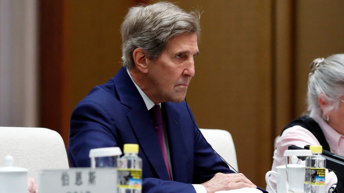 FILE – US Climate Envoy John Kerry attends a meeting with Director of the Office of the Foreign Affairs Commission of the Communist Party of China's Central Committee Wang Yi at the Great Hall of the People in Beijing on July 18, 2023. 