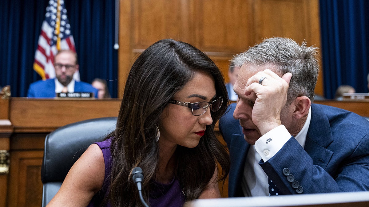 Boebert and Perry speak to each other during a House oversight hearing