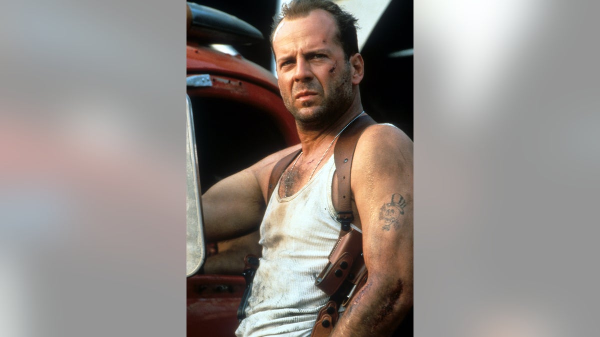 Bruce Willis wounded and disheveled in a scene from the film Die Hard: With a Vengeance