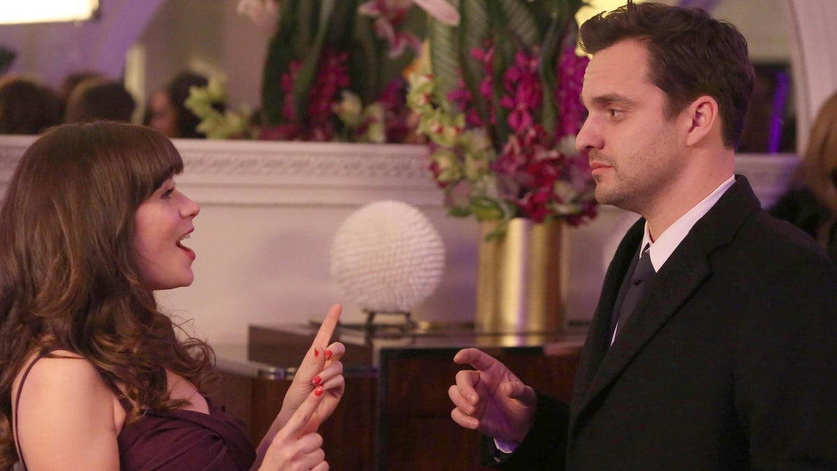 Zooey Deschanel and Jake Johnson in a scene from New Girl