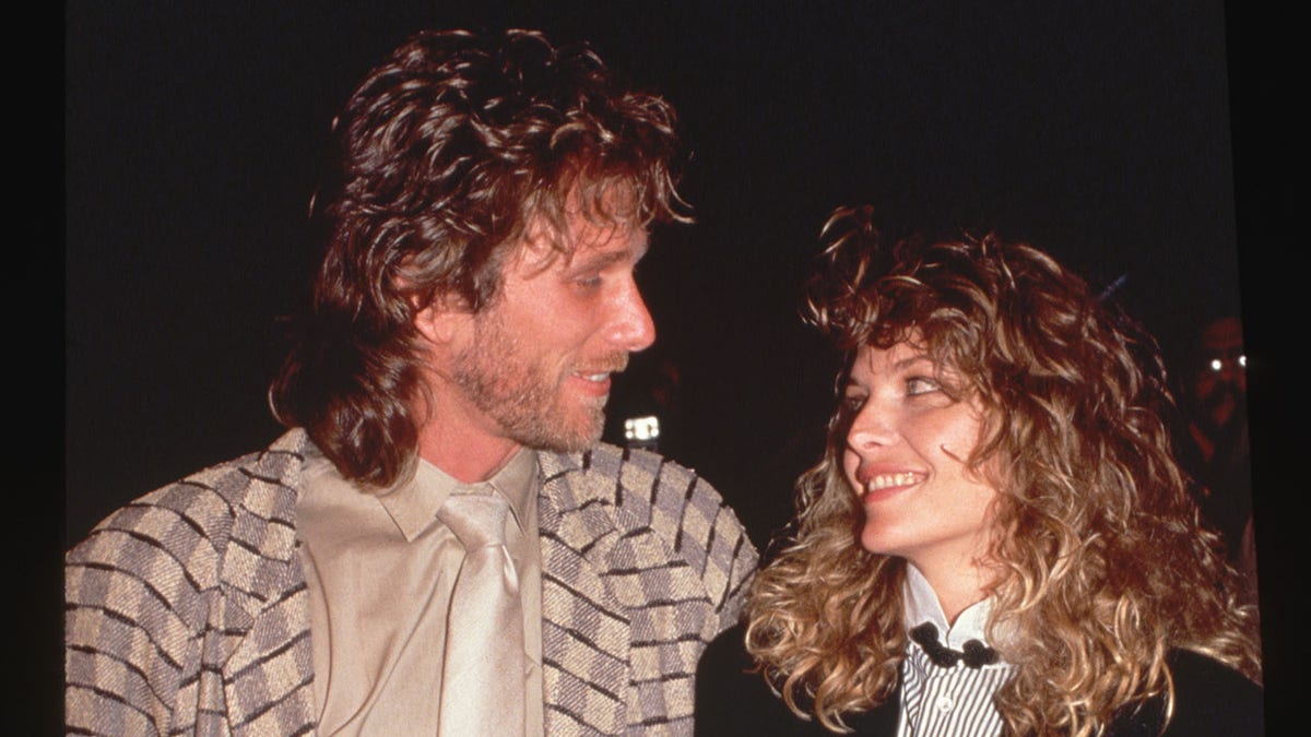A photo of Peter Horton and Michelle Pfeiffer