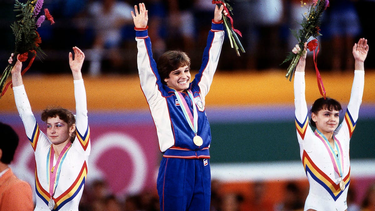Mary Lou Retton atop the podium at the 1984 Olympic games