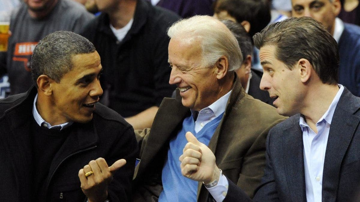 U.S. President Barack Obama (L) greets Vice President Joe Biden (C) and his son Hunter Biden