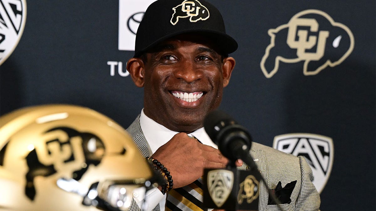 Deion Sanders takes questions from the media