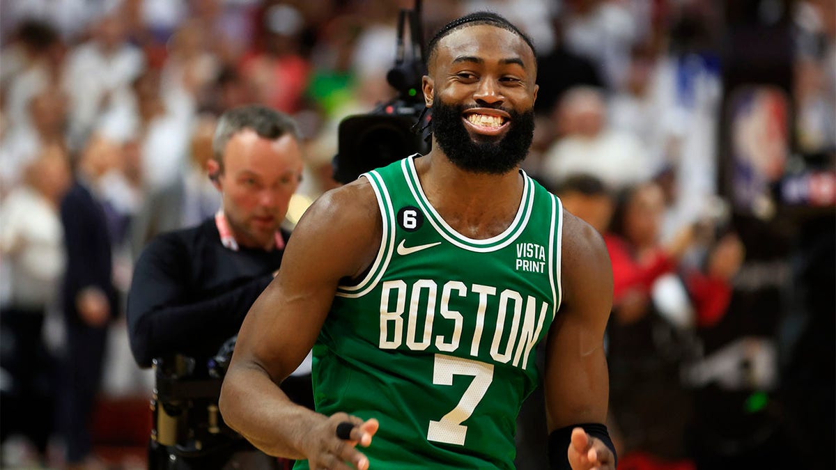 Jaylen Brown reacts after beating the Heat