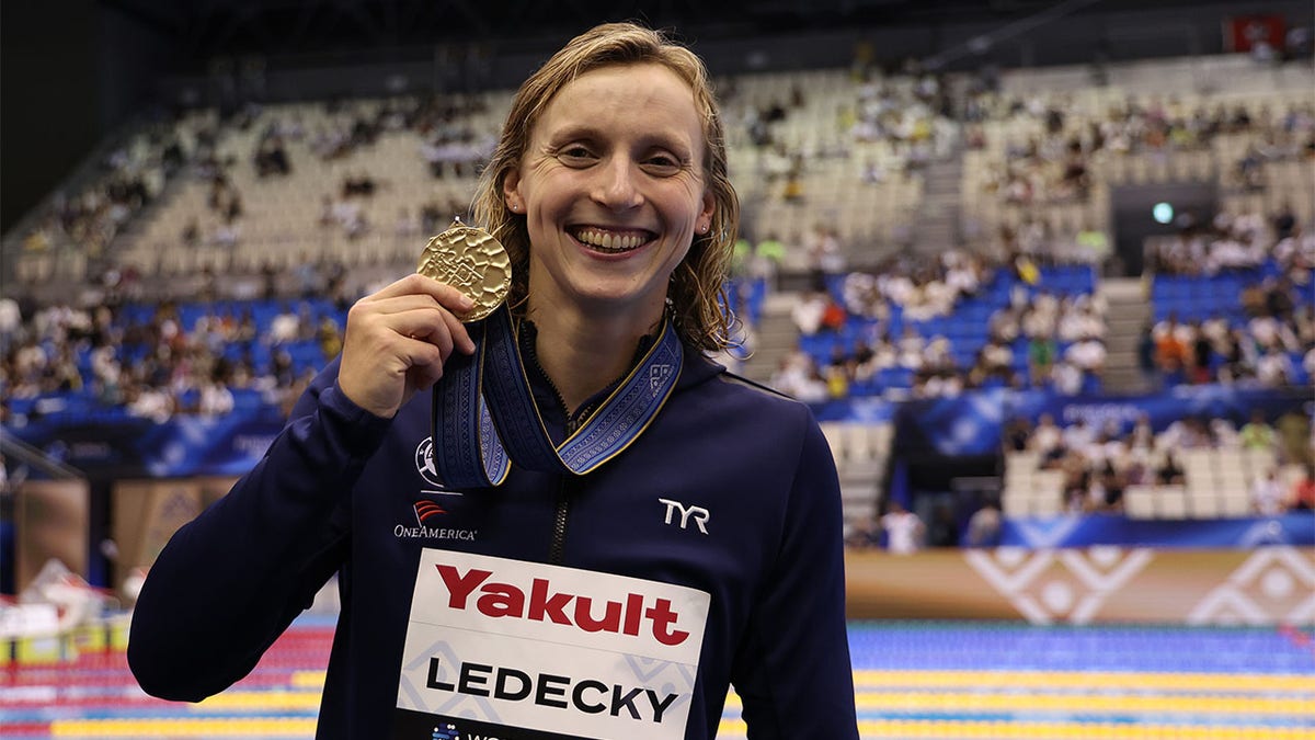 Katie Ledecky breaks Michael Phelps' record at Worlds with gold