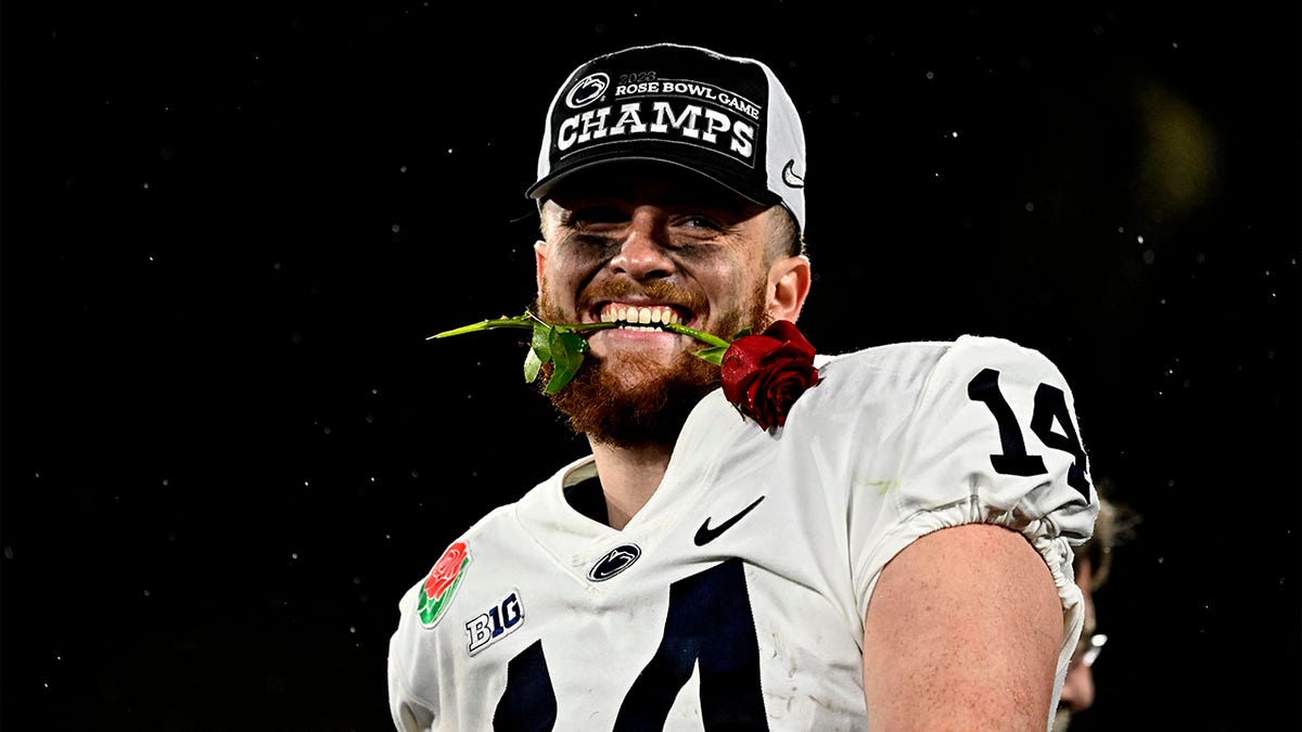 Penn State quarterback Sean Clifford celebrates a Rose Bowl win