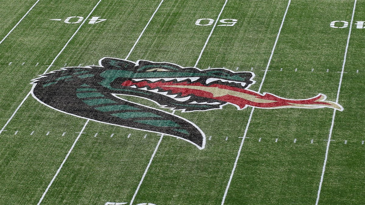 The UAB logo on the football field