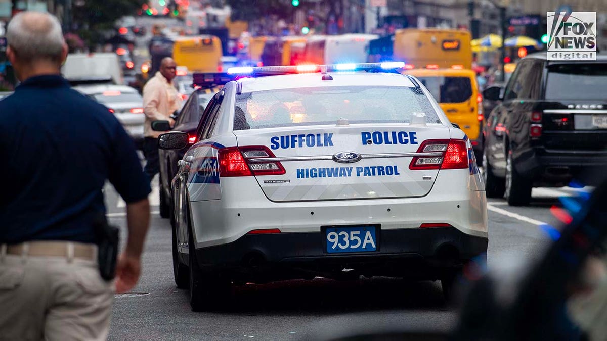 Suffolk Highway Patrol remains parked outside of 385 Fifth Avenue