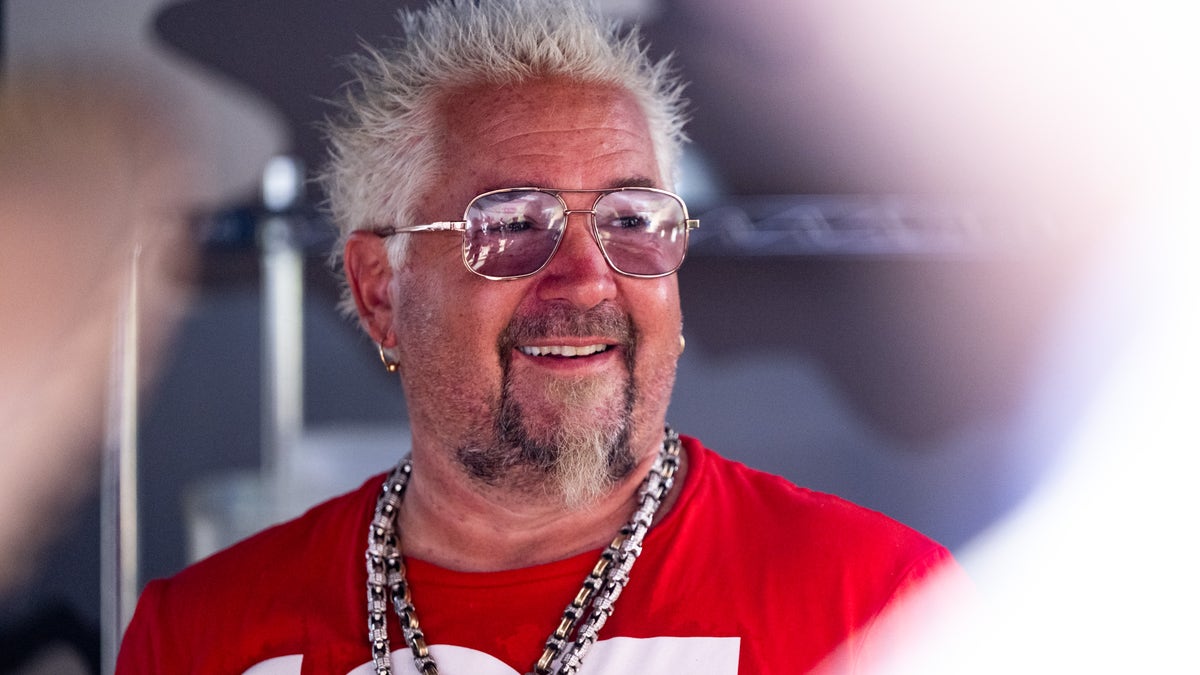 Guy Fieri sports red shirt at Stagecoach festival