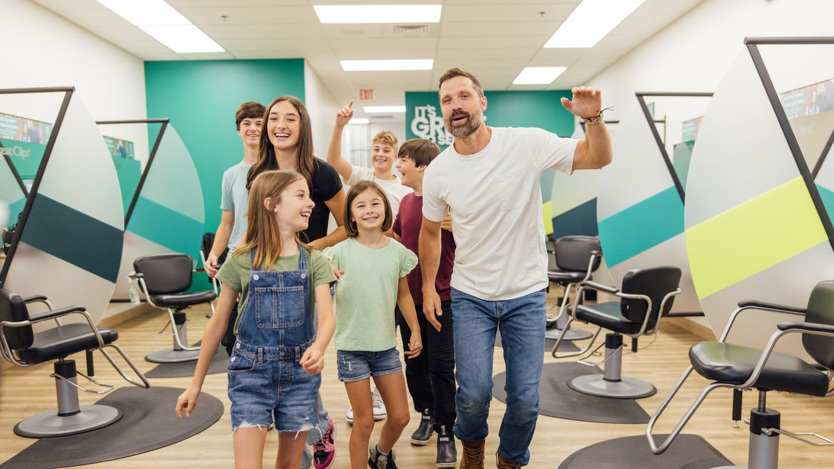 Hayes family dancing in Great Clips