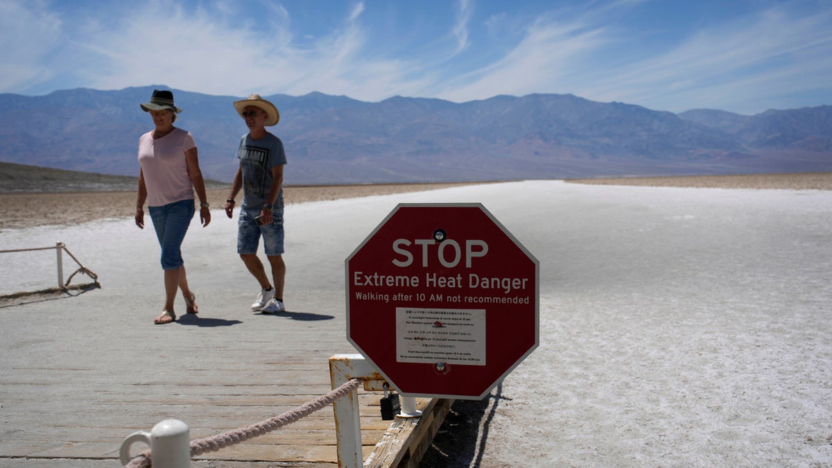 Visitors at Badwater Basin in Death Valley National Park